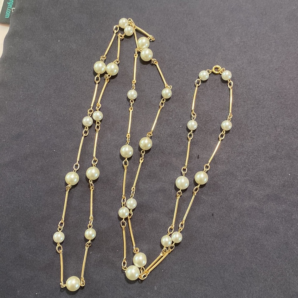 Vintage tin cup, pearl station, flapper necklace.